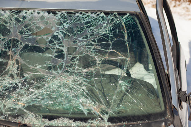 istock Broken car glass. The windshield cracked. Damaged transport. 1324731817