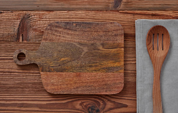istock Cutting board, table cloth and wooden spoon 1324733214
