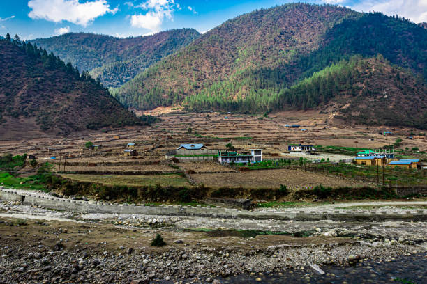 istock mountain valley village with bright blue sky at morning from flat angle 1324733674
