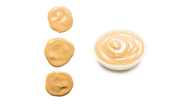 istock Mushroom sauce splashes isolated on white background. 1324735903
