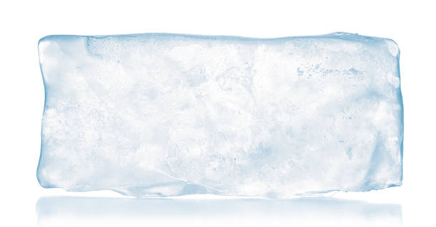 a translucent rectangular block of pure ice, isolated on white background. purity and freshness concept. - ice blocks imagens e fotografias de stock