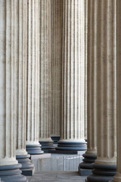 istock High marble columns as background, architectural design in style of classicism. Architectural pattern 1324739454