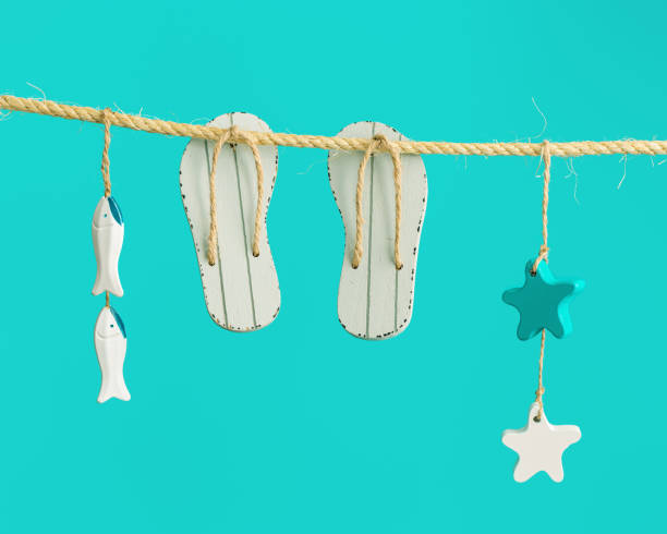 istock Summer composition with marine items and beach shoes. Summertime rest or vacation minimal concept 1324739527