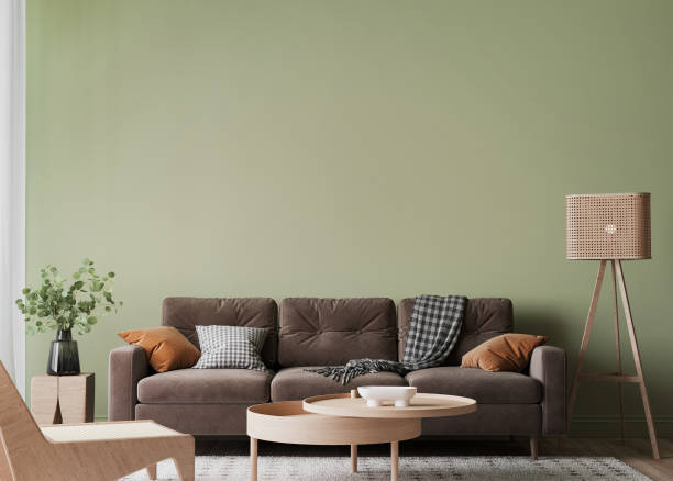 istock Simple minimal modern style interior, brown sofa on green wall background 1324739818