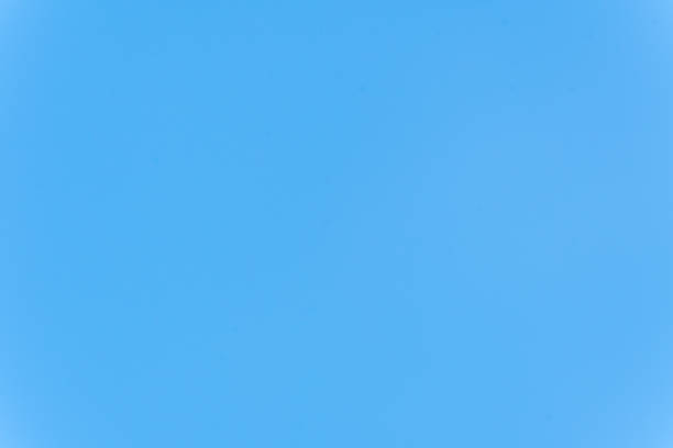 Background of light blue clear sky without clouds