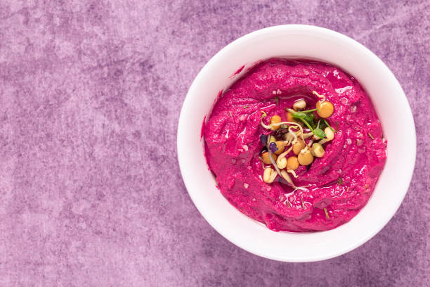 istock Roasted Beet Hummus with sprouted grains in a bowl 1324741263