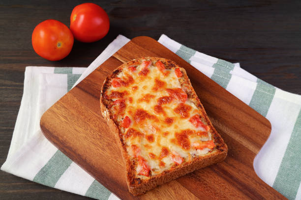 istock Fresh baked delectable homemade pizza toast on kitchen's table 1324741718