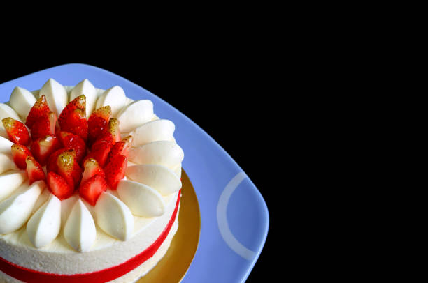 istock Gorgeous Fresh Strawberry Vanilla Short Cake on Black Background with Copy Space 1324742107