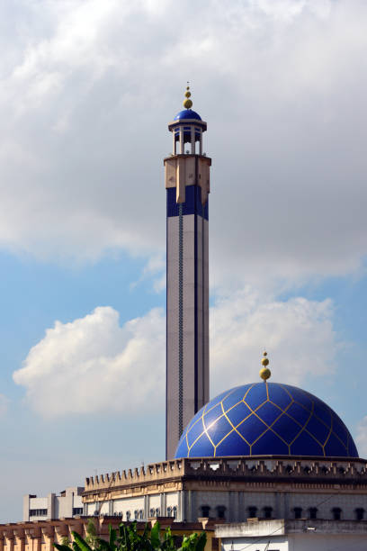 Abidjan, Ivory Coast / Côte d'Ivoire: Plateau Mosque / Grande Mosquée du Plateau, located at the corner of Avenue Crosson Duplessis and Boulevard Botreau Roussel / surmounted by a minaret with a height of 65 m and with a capacity of 6,500 faithful (3,500 on the esplanade and 3,000 in the prayer hall).