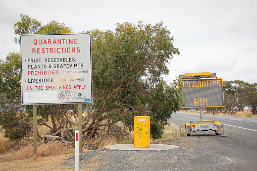 Australian PIRSA interstate biosecurity quarantine bin in Dukes Highway. Taken in Wolseley, South Australia on Dec 7, 2014.