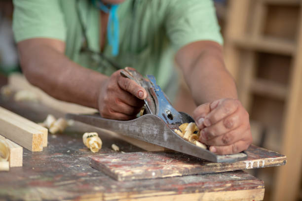 istock Mexican woodworker, carpenter working in his workshop close-up 1324744732