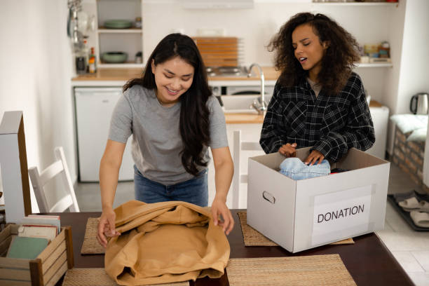 istock Two young women preparing donations for charity 1324745840