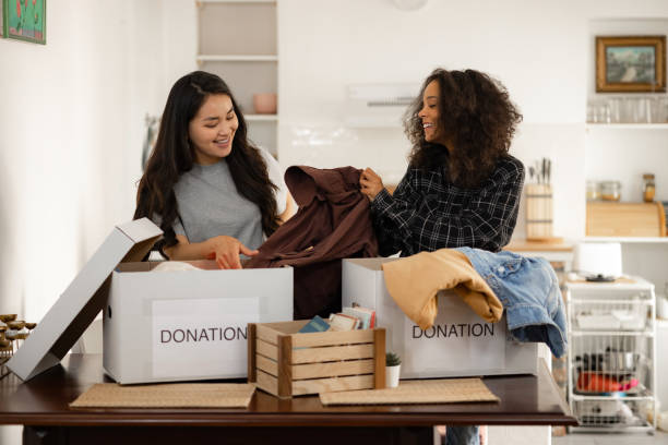 istock Two young women preparing donations for charity 1324745848
