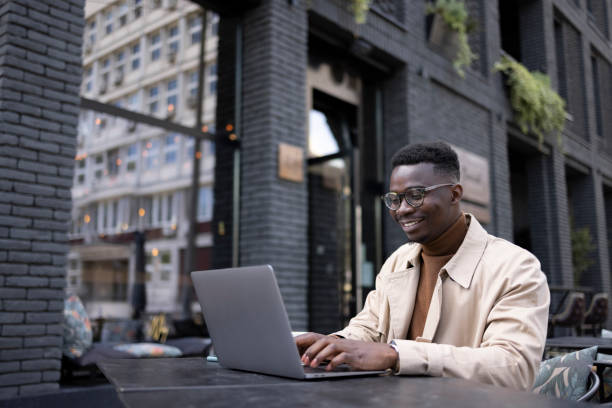 istock Young African American male freelancer working on a laptop 1324748058