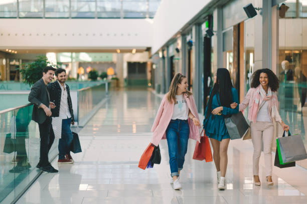 istock Friends shopping together 1324751328