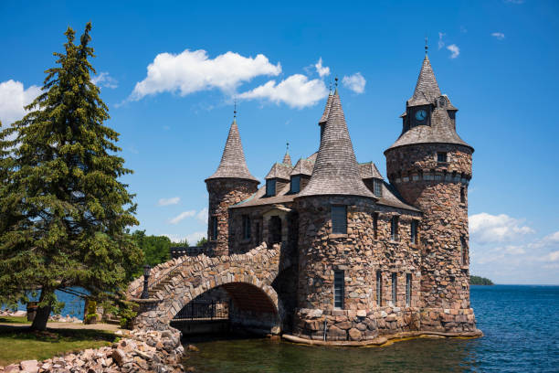 The power house of Boldt Castle, a major landmark and tourist attraction, is located in the Thousand Islands region of New York on Heart Island in the Saint Lawrence River. The power house of Boldt Castle, a major landmark and tourist attraction, is located in the Thousand Islands region of New York on Heart Island in the Saint Lawrence River. castle stock pictures, royalty-free photos & images