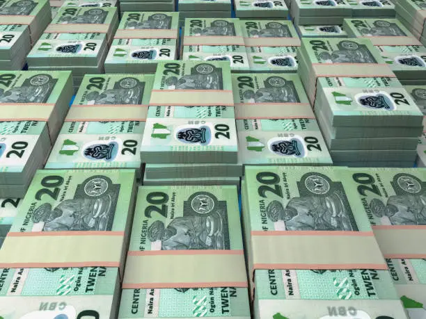 Money of Nigeria. Nigerian naira bills. NGN banknotes. 20 polymer. Business, finance, news background.