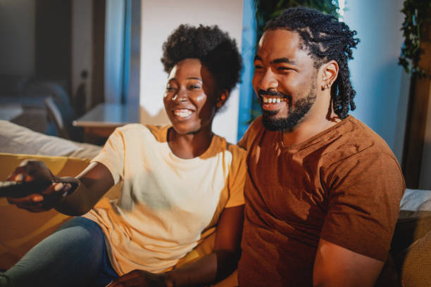 istock Couple watching a movie at home 1324755065