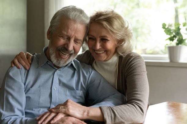 istock Happy old couple enjoy maturity together at home 1324756566