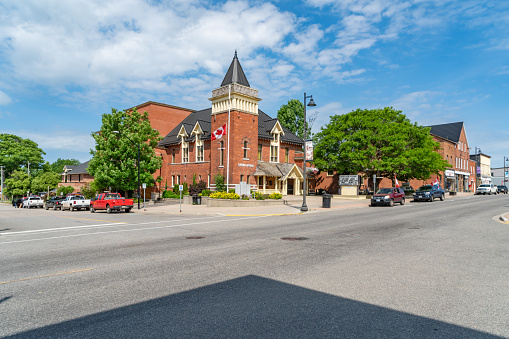 Corner of High Street and Main Street  Historic downtown Moose Jaw.  Large building on the left is City Hall which is a designated Heritage building. Architecture is Edwardian Classical. Completed in 1914.