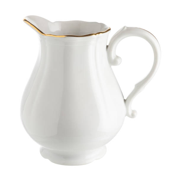 istock Antique ceramic teapot isolated on white. 1324766087