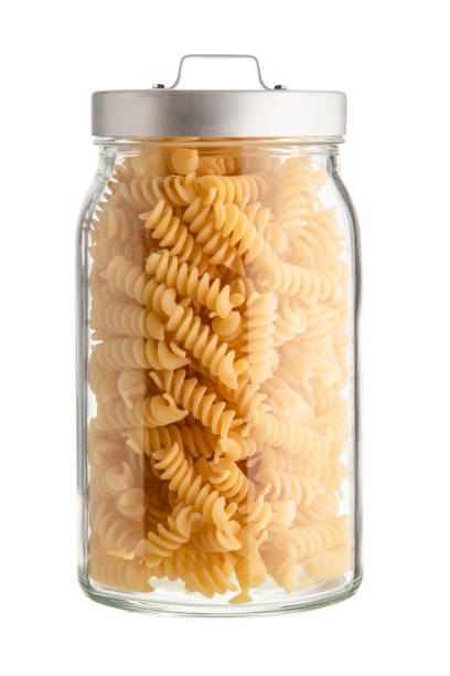 istock Jar of pasta isolated on white. 1324766264