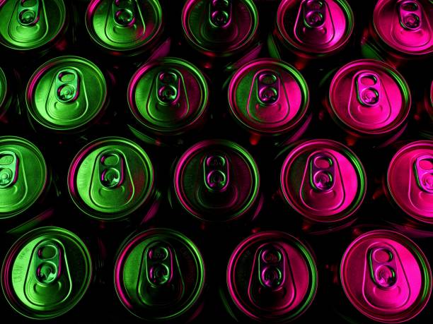 Abstract image of light painted aluminum beer can tops. Brightly colored graphic design of aluminum can tops suitable for art or as a textured background.
