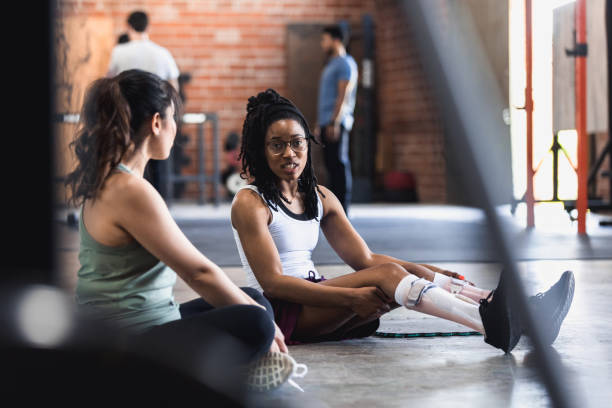 istock Female friends cool down together after exercising 1324768884