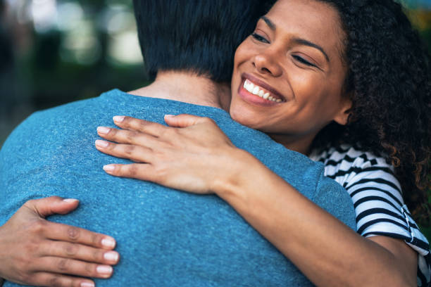 istock Couple hugging outdoors 1324777752