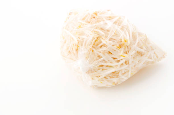 istock Fresh Bean Sprouts  in Plastic bag on White background 1324777783