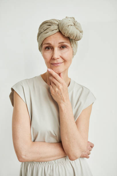 istock Beautiful Woman Wearing Headscarf 1324780619