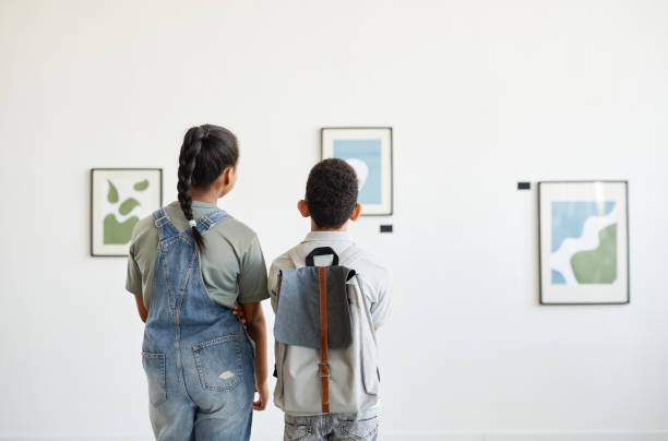 istock Two Schoolchildren in Art Museum 1324782254