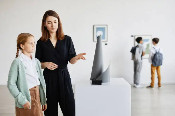 Photo of Mother and Daughter in Art Museum