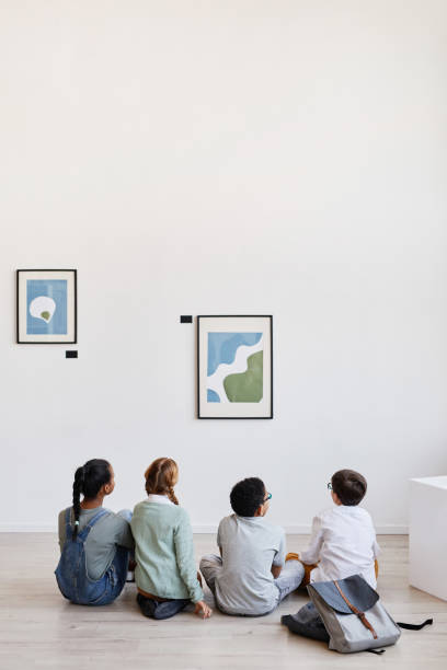 istock Kids Looking at Painting in Gallery 1324782267