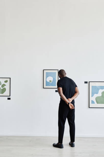 istock African American Man in Modern Art Gallery 1324782289