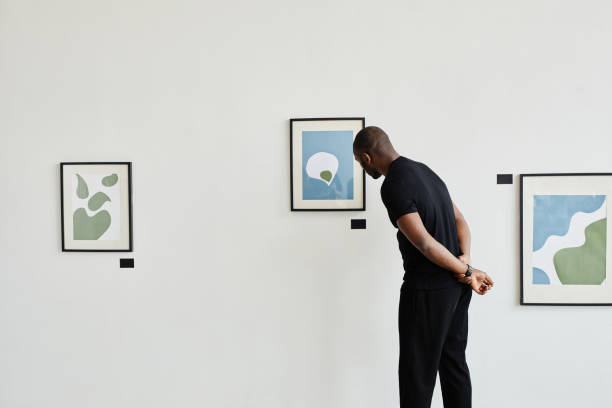 istock African American Man in Art Gallery 1324782296