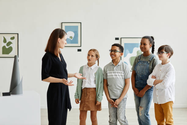 istock Group of Kids Visiting Art Gallery 1324782307