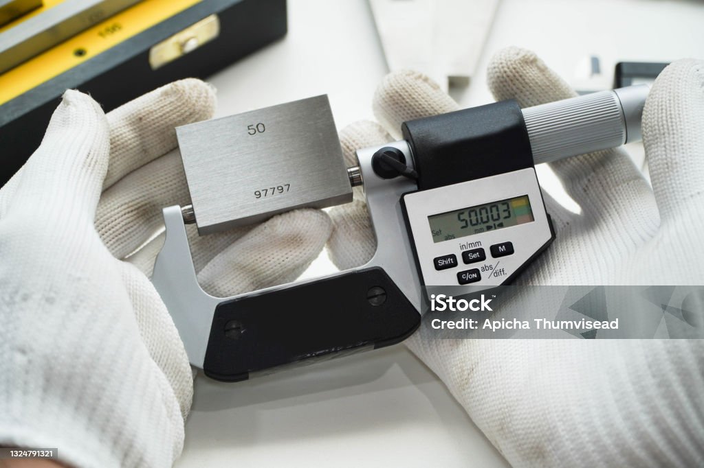 Digital micrometers and digital vernier calipers perform calibration on block grades,Gauge Blocks Precision Metric Caliper Stock Photo