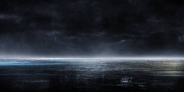 3D Rendering Abstract asphalt light in a dark empty street and rain
