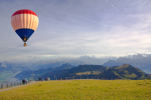 istock Hot air balloon flying over the Mount Rigi 1324807917
