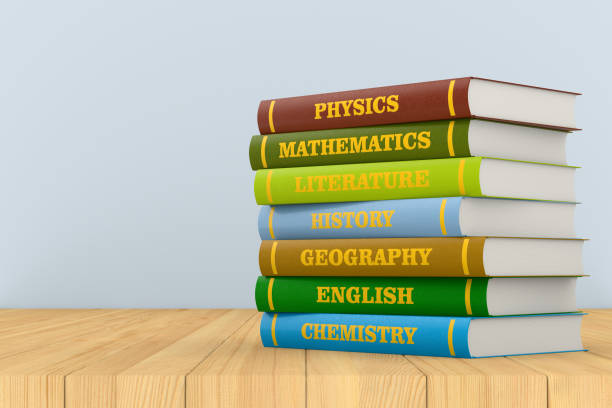 istock Stack of hardcover text books on wooden surface. 3D illustration 1324813287