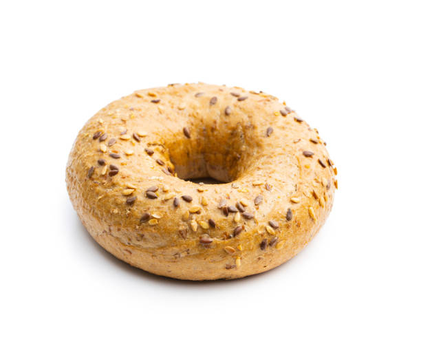 bagel al forno integrale. - bagel bread isolated circle foto e immagini stock