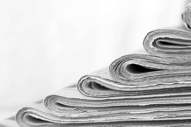 stack of newspaper, close-up. journalism concept - newspaper business close up nobody imagens e fotografias de stock