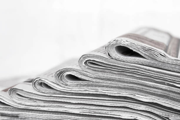 istock Stack of newspaper, close-up. Journalism concept 1324814496