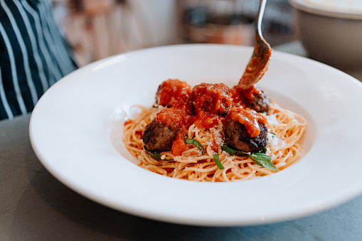 Chef preparing spaghetti