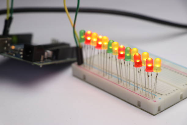 istock Series of LED glowing controlled using electronic board. Do it yourself product engineering concept 1324818513