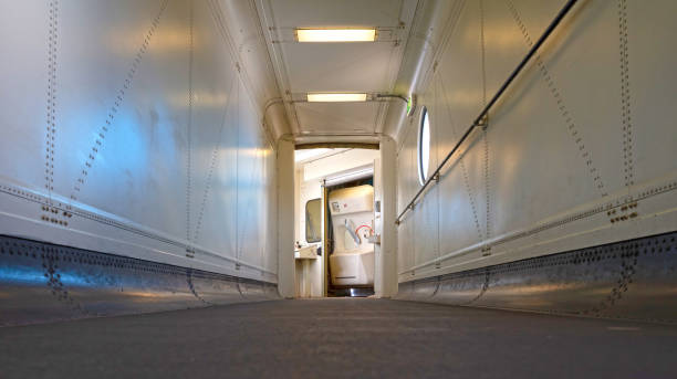 istock View through door into empty narrow old airbridge 1324826967