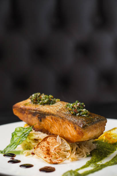 istock Baked salmon with rice and vegetables 1324828170