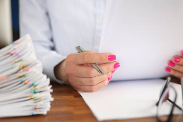 istock Business documentation report in female hands closeup 1324828577