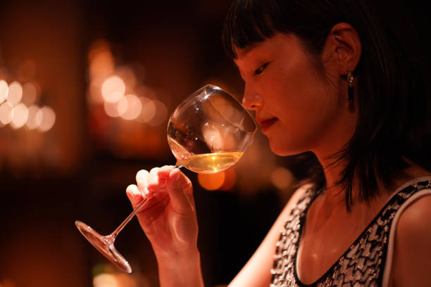 istock Woman drinking at the bar 1324828642